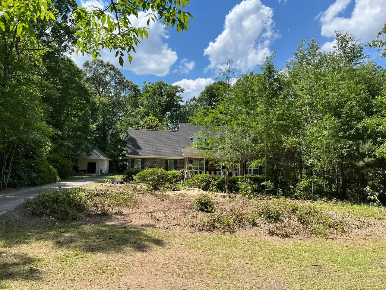 Property after overgrown trees were removed in Cerro Gordo, North Carolina
